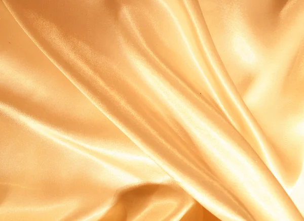 Slät elegant gyllene siden som bakgrund — Stockfoto