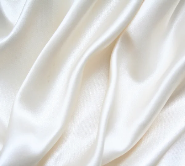 Sutra putih yang halus dan elegan sebagai latar belakang — Stok Foto