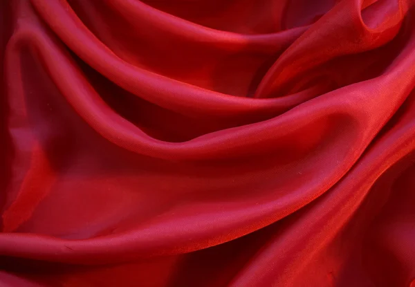 Suave seda vermelha como fundo — Fotografia de Stock