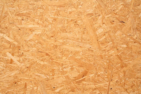 Yellow wood chipboard as background — Stock Photo, Image