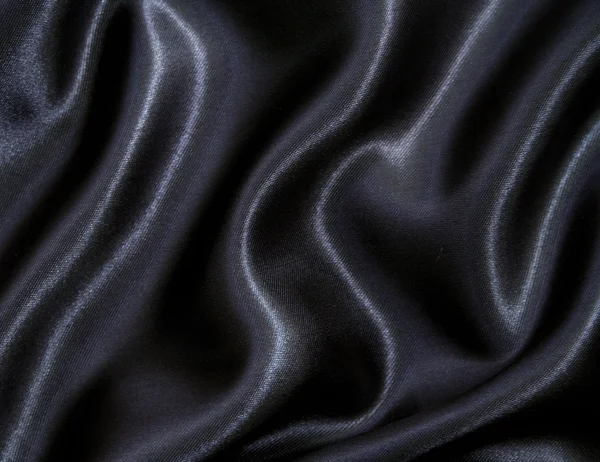 Smooth elegant black silk as background — Stock Photo, Image