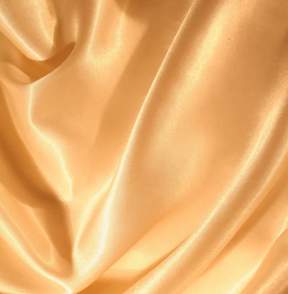 光滑优雅金色丝绸作为背景 — 图库照片