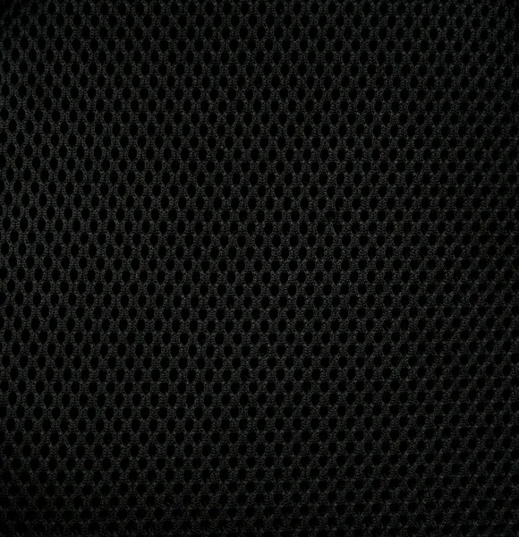 Чёрная синтетическая ткань в качестве фона — стоковое фото