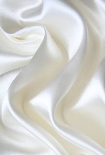 背景として滑らかなエレガントな白い絹 — ストック写真