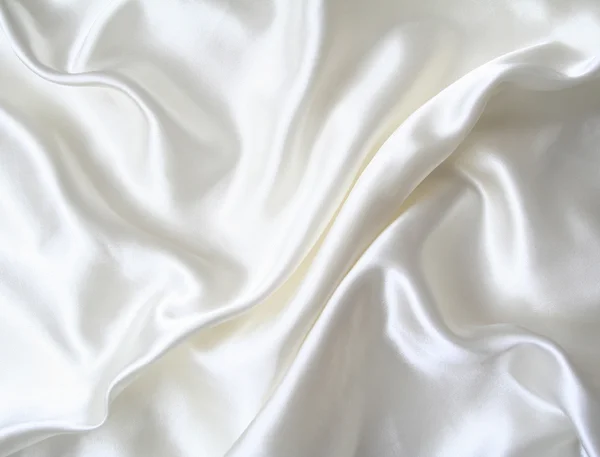 Glatte elegante weiße Seide als Hintergrund — Stockfoto
