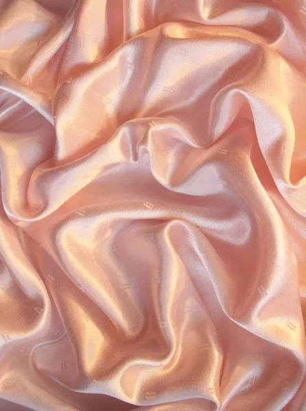 Sima, elegáns rózsaszín selyem háttereként — Stock Fotó