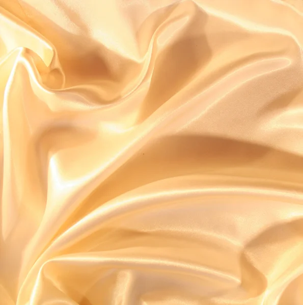 Smooth elegant golden satin as background — Stock Photo, Image