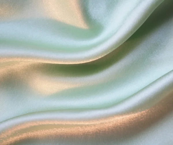 Gładkie elegancki jedwab zielony jako tło — Zdjęcie stockowe