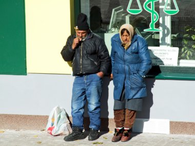 Hobos in the street small small town. Slovakia, 2007 clipart