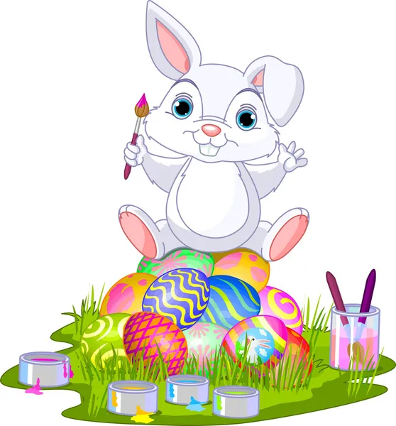 Pasen. Bunny zittend op eieren — Stockvector