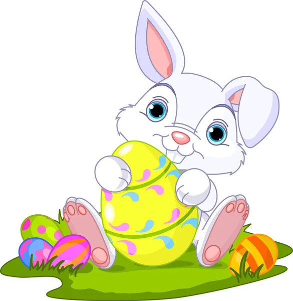 Semana Santa. Conejo con huevo de Pascua — Vector de stock