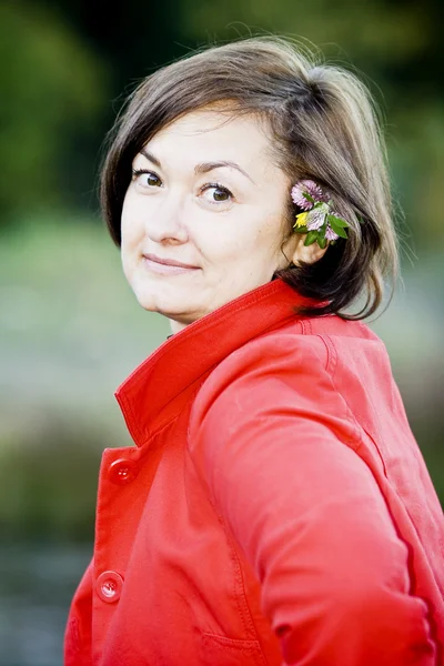 Сute lady in a red jacket — Stock Photo, Image
