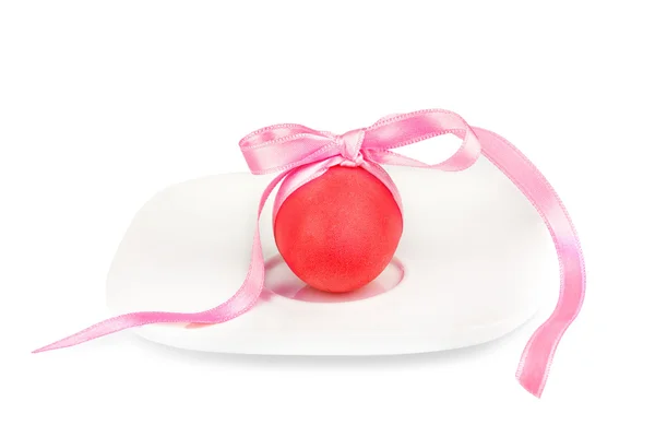 Painted Pastel egg on the plate with bow to celebrate Easter — Stock Photo, Image