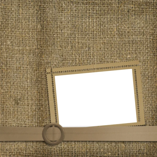 Cinturão glamouroso com um velho fundo desgastado de pano de saco — Fotografia de Stock