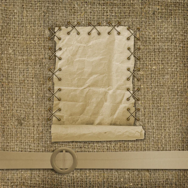 Гламурный пояс со старым изношенным фоном из мешковины — стоковое фото