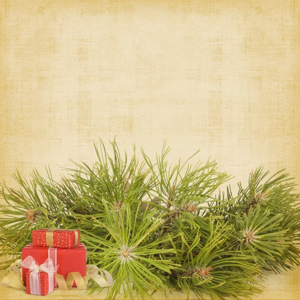 Christmas greeting vintage card with branches of spruce — Stock Photo, Image