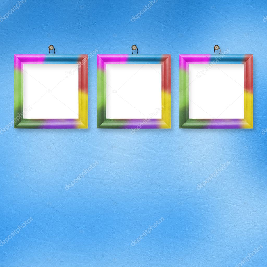 Multicolored bright frames hanging on the abstract pastel backgr