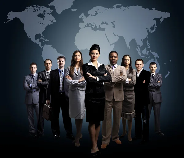 Business-Team mit Weltkarte — Stockfoto