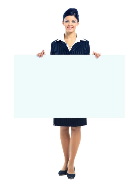 Gelukkig lachend jonge zakenvrouw tonen leeg bord, geïsoleerd over w — Stockfoto