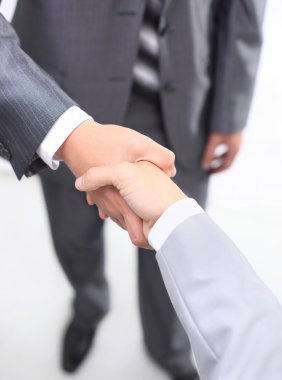 Handshake of business partners after signing promising contract clipart