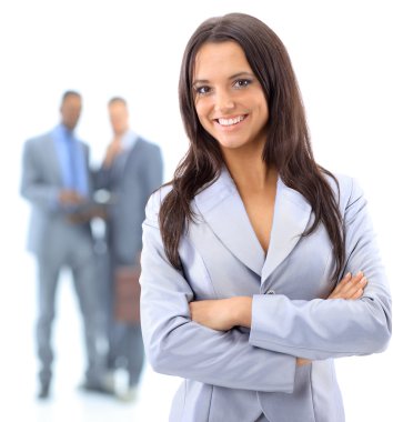 Portrrait of a smiling young business woman with discussing in background clipart