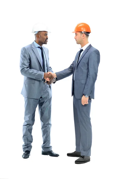 Dos hombres de negocios estrechando sus manos — Foto de Stock