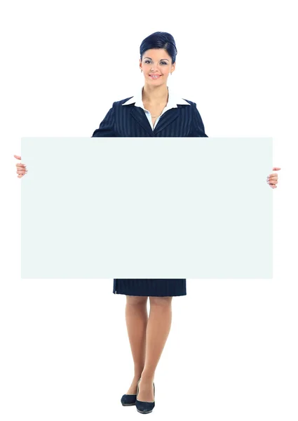 Glücklich lächelnde junge Geschäftsfrau zeigt leeres Schild, isoliert über weißem Hintergrund — Stockfoto