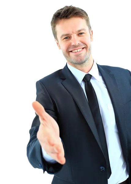 Ευτυχής χαμογελαστοί επιχειρηματίας, δίνοντας το χέρι για μια χειραψία που απομονώνονται σε λευκό φόντο — Φωτογραφία Αρχείου