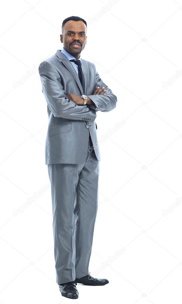 Full length portrait of a happy businessman standing against isolated white background