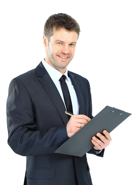 Biznesmen pisania schowku nosić elegancki garnitur i krawat isola — Zdjęcie stockowe