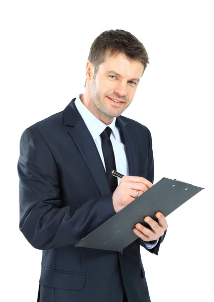 Businessman writing on clipboard wear elegant suit and tie isola Stock Image