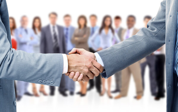 Handshake isolated on business background