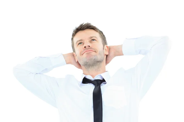 Retrato de hombre de negocios guapo relajándose con las manos detrás de la cabeza — Foto de Stock