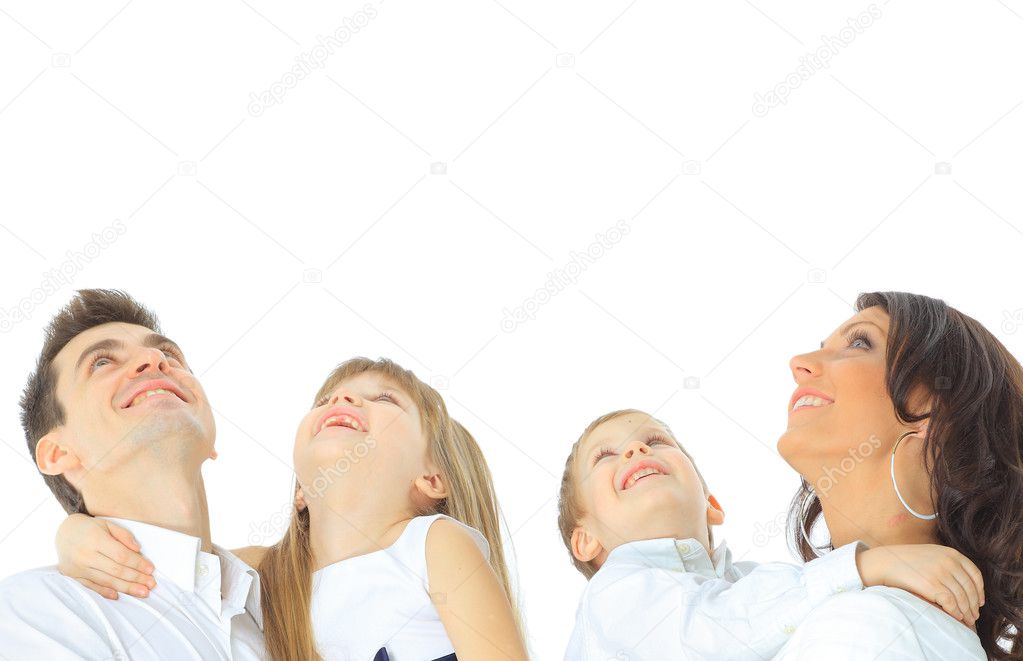 Photo of happy family looking upwards on white background