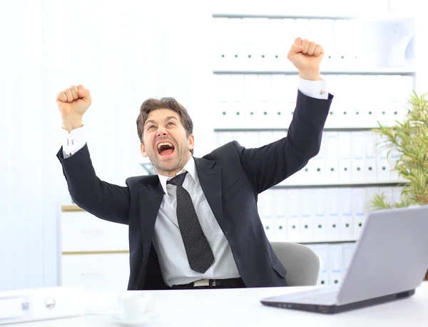 Successful business man with arms opened at the office — Stock Photo, Image
