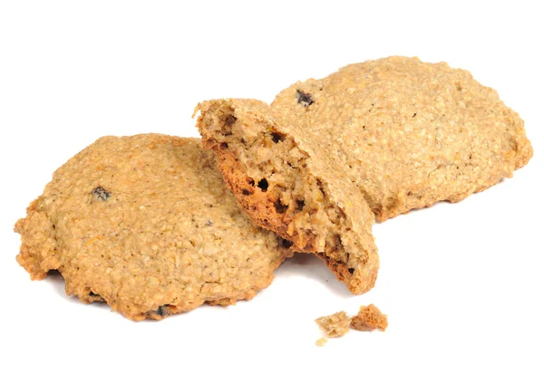 Havermout cookies met kruimels geïsoleerd op witte achtergrond — Stockfoto