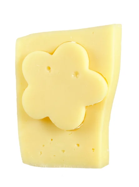 Цветок сыра в прямоугольном куске сыра — стоковое фото