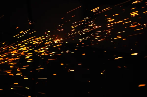 Glowing Flow of Sparks in the Dark — Stock Photo, Image
