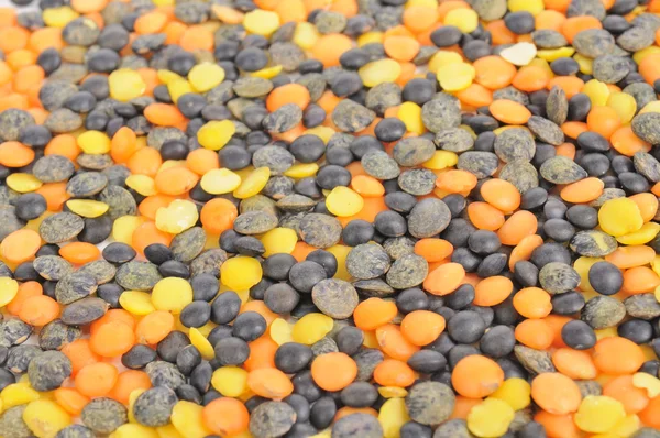 Black, Orange and Yellow Lentils — Stock Photo, Image
