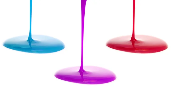 浇注的红色、 紫色和蓝色油漆/指甲油 — 图库照片