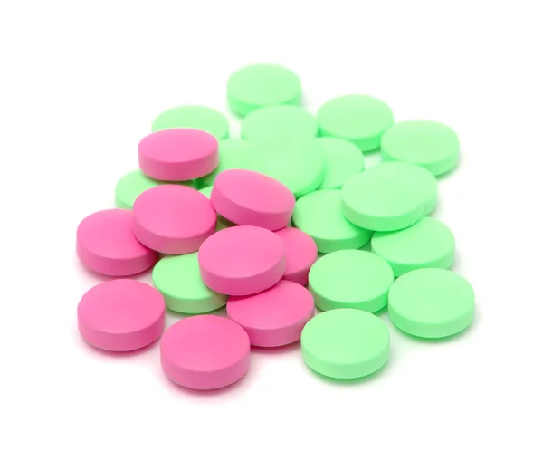 Tabletki różowy i zielony — Zdjęcie stockowe