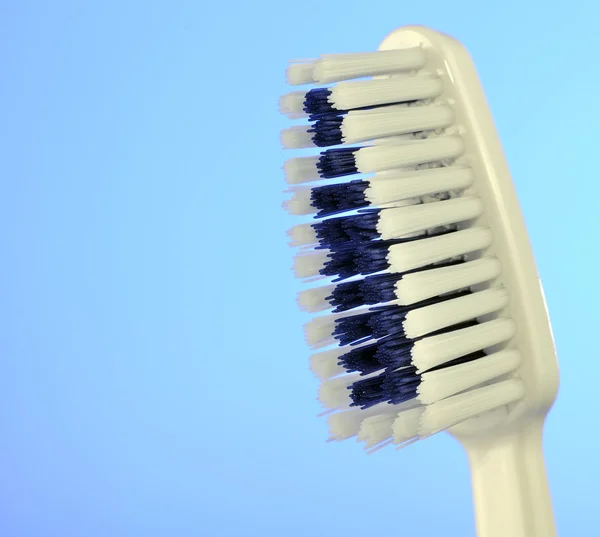 Toothbrush on Blue Background — Stock Photo, Image