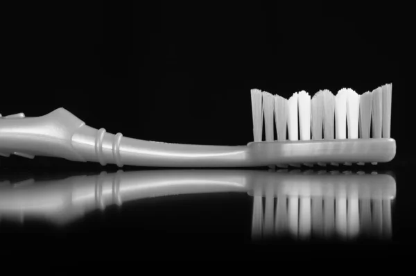 Toothbrush on Black Background — Stock Photo, Image