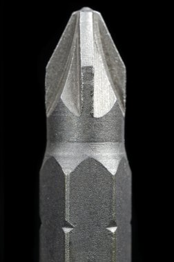 Screwdriver Bit Close-Up on Black Background clipart