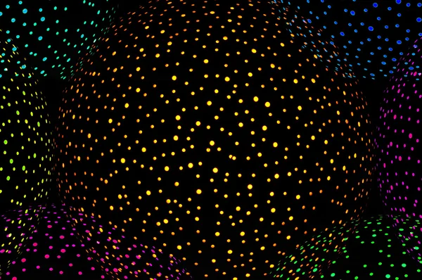 Bolas de disco brilhantes multicoloridas no fundo preto — Fotografia de Stock
