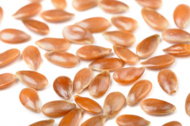 Flax Seeds Macro on White Background clipart