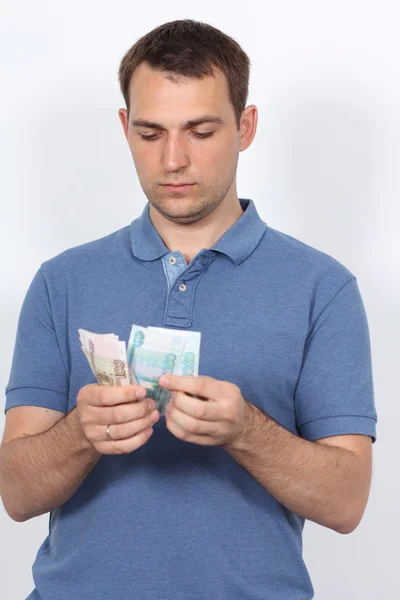 Homem encontra dinheiro — Fotografia de Stock