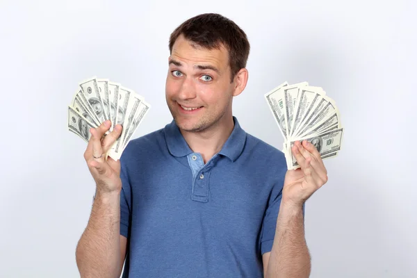 Homem com dinheiro mostrando polegares para cima — Fotografia de Stock