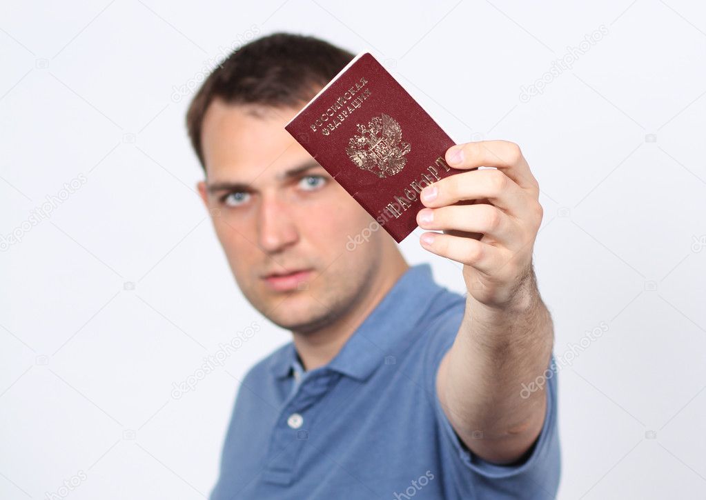 Man holding russian passport