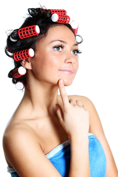 Portrait of a young woman in curlers — Stock Photo, Image